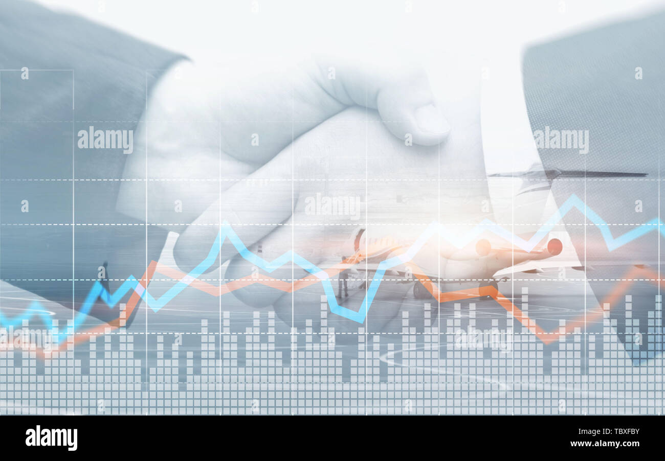 Double exposure of city and rows of coins with stock and financial graph on virtual screen. Business Investment concept. Stock Photo