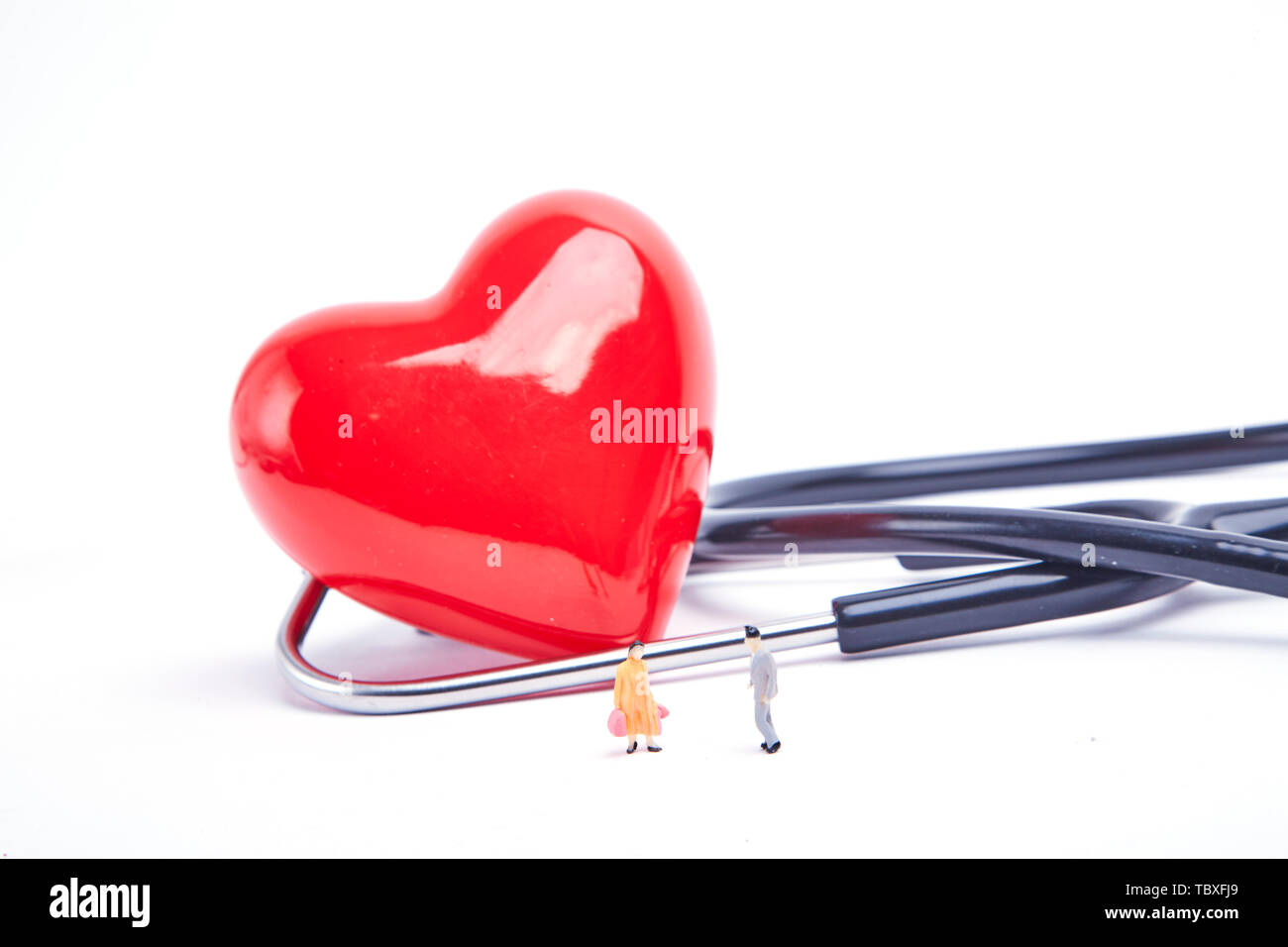 Red love and stethoscope on table Stock Photo Alamy
