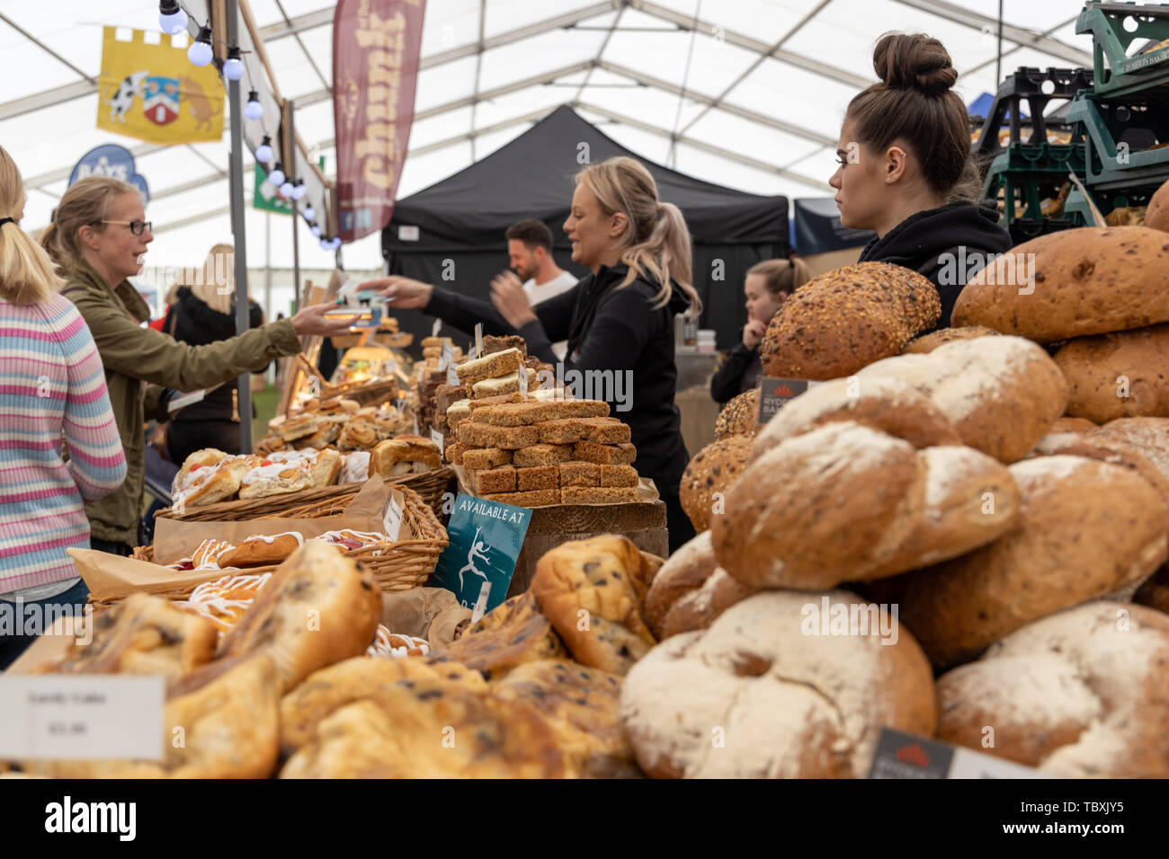 Customer making purchase at Bakery Stall at the Devon County Show Stock Photo