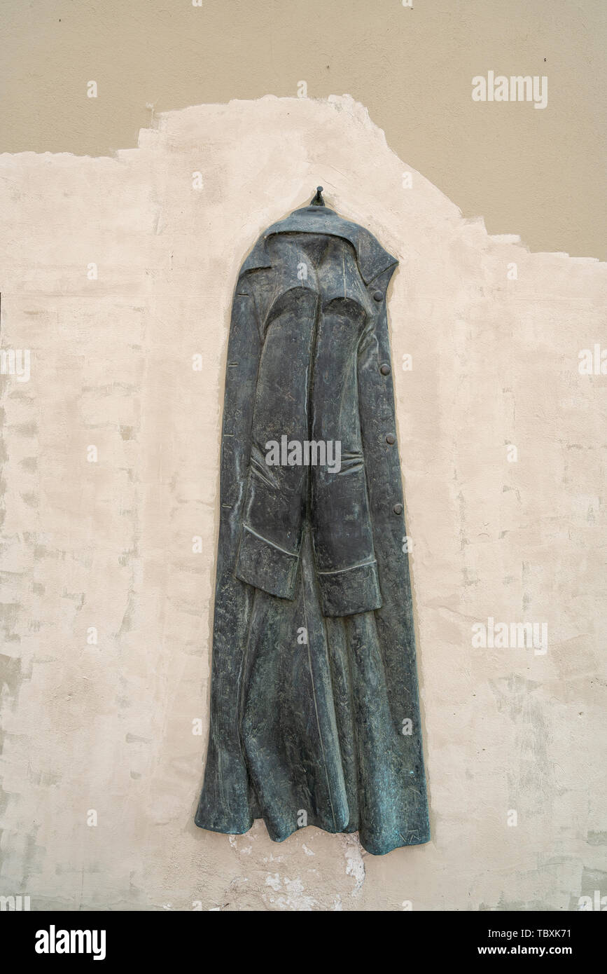 Vilnius, Lithuania. May 2019.   A view of the bronze sculpture of Antanas Vivulskis overcoat  made by the sculptor Vytautas Navlivaika Stock Photo