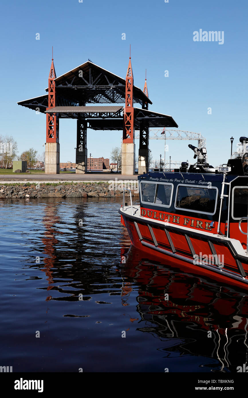 Music pavilion in Bayfront of Duluth Harbor with a historical fire boat