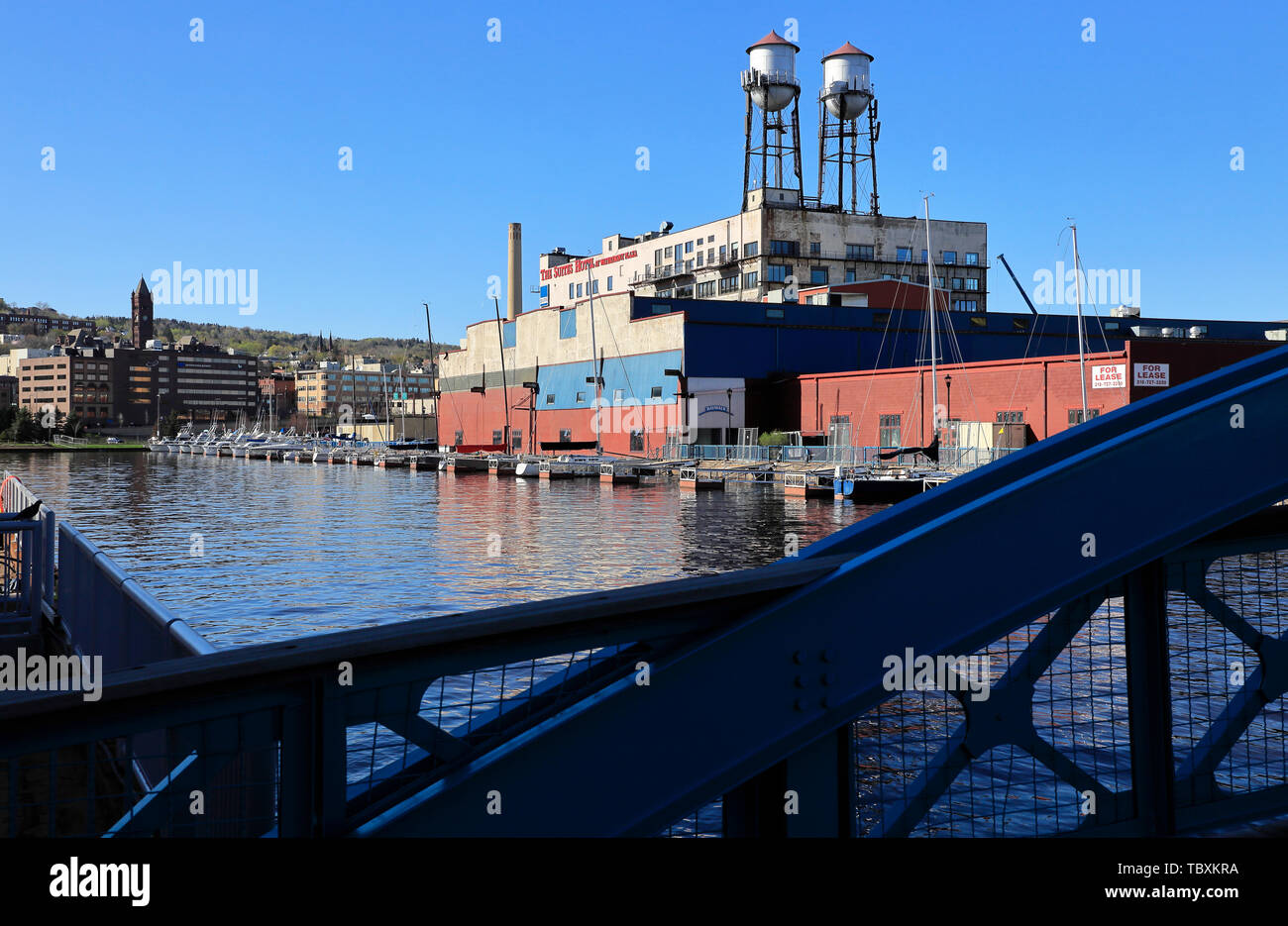 The Twin water towers on top of the Suites Hotel building by Waterfront Marina with Minnesota Slip Draw Bridge in foreground.Duluth.Minnesota.USA Stock Photo