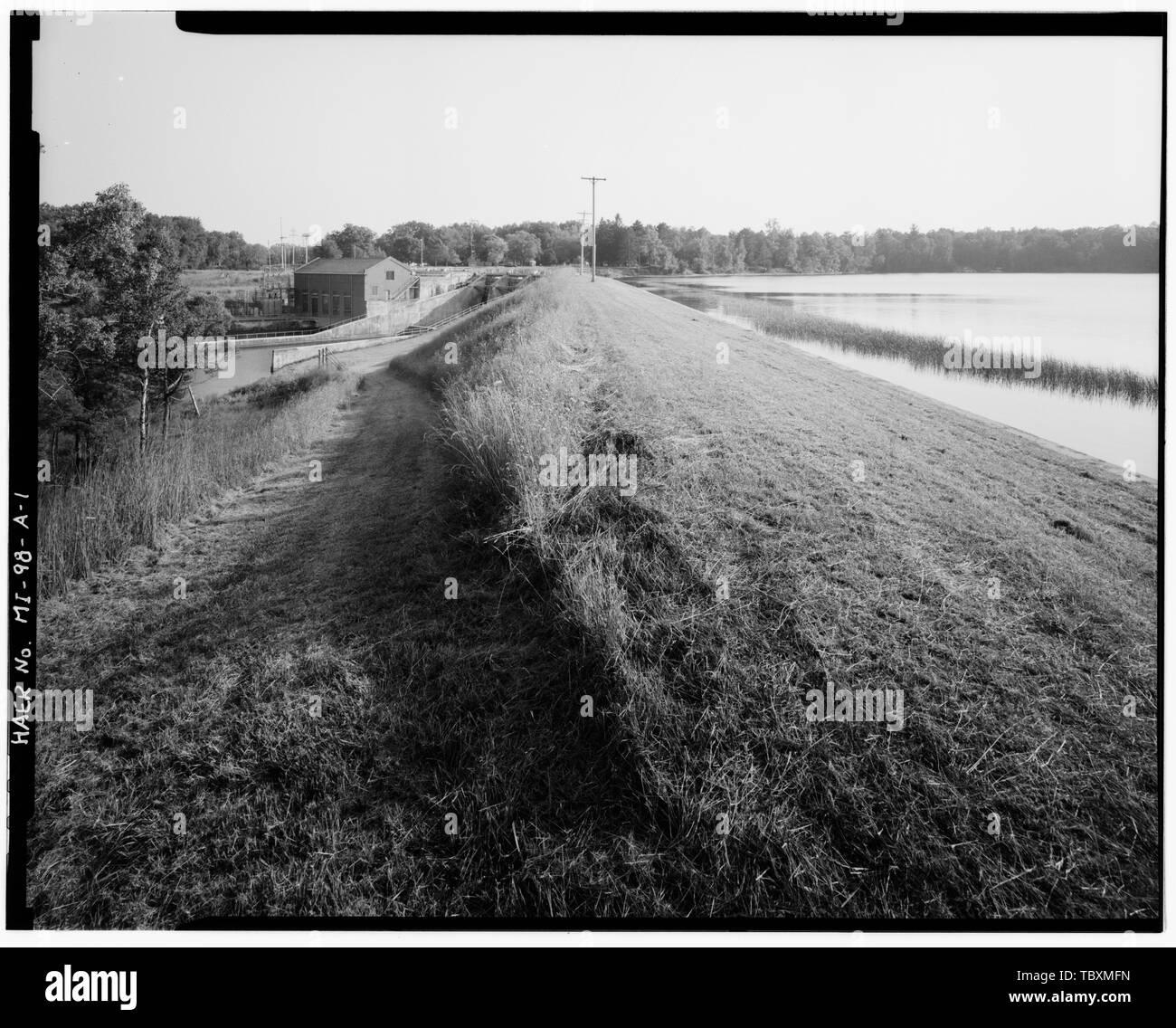 NORTH EMBANKMENT IN FOREGROUND, WITH (LR) SUBSTATION (MI98D