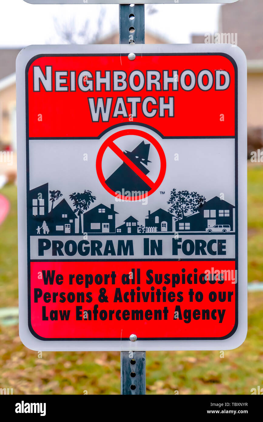 Close up of a Neighborhood Watch sign against a blurred background Stock Photo