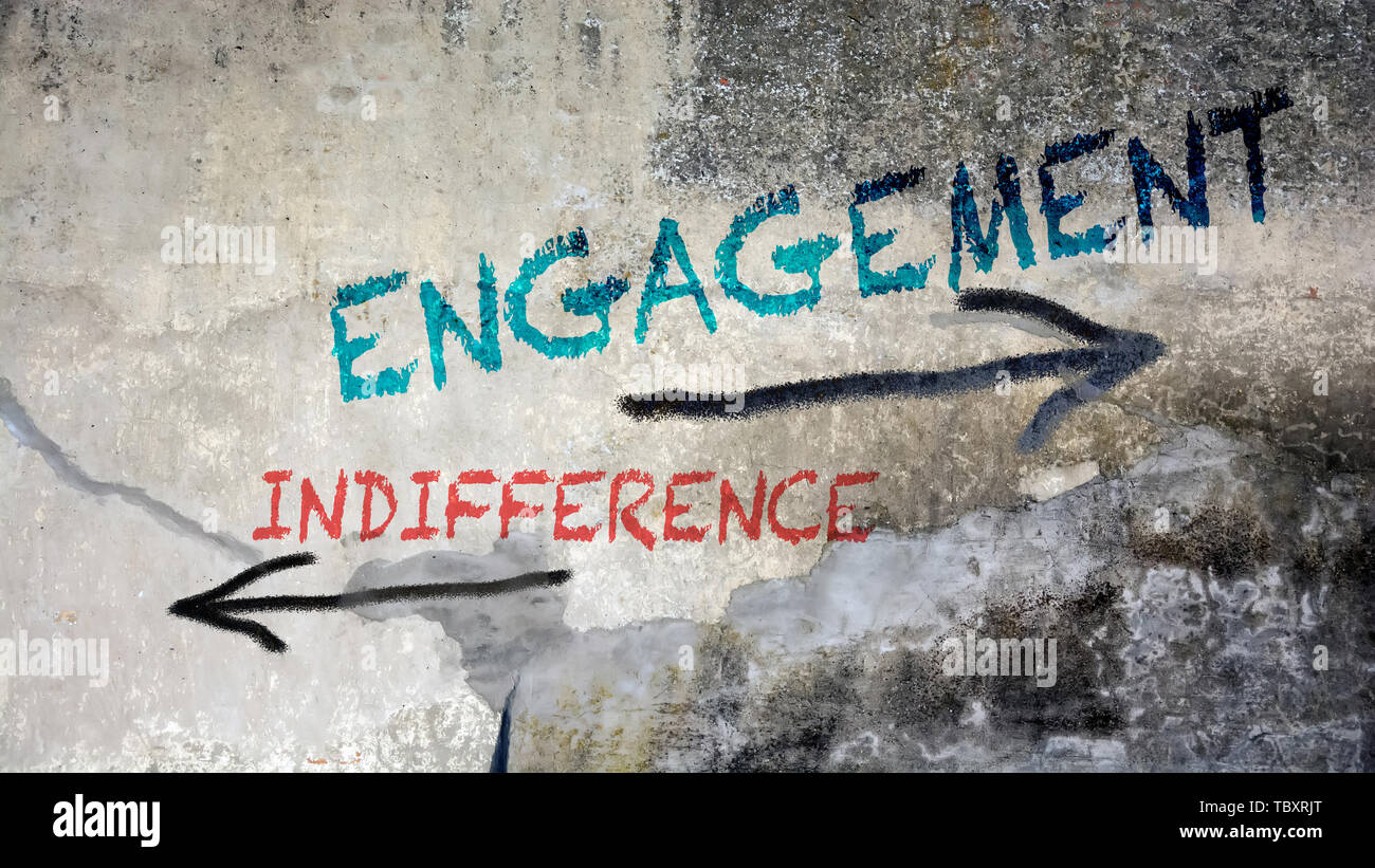 Wall Graffiti the Direction Way to Engagement versus Indifference Stock Photo