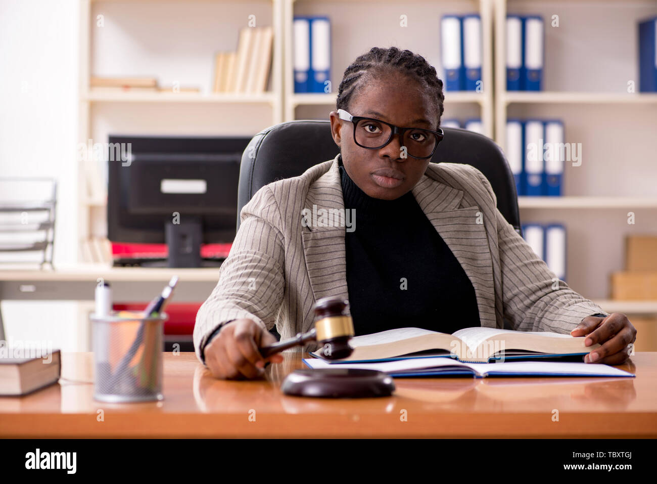 Black female lawyer in courthouse Stock Photo - Alamy