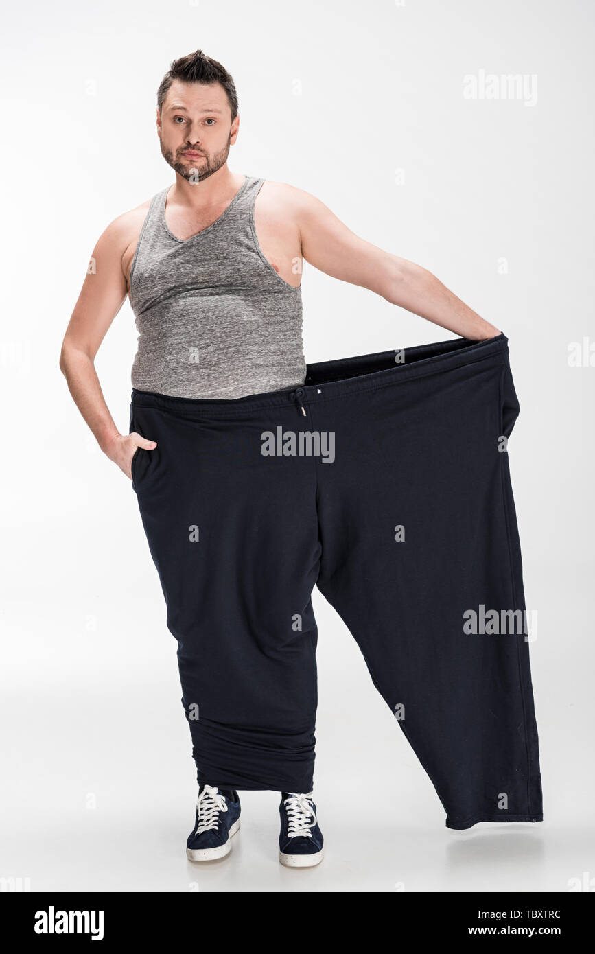 Man in Oversized Pants in Weight Loss Concept Stock Image - Image of  fitness, gain: 169906723