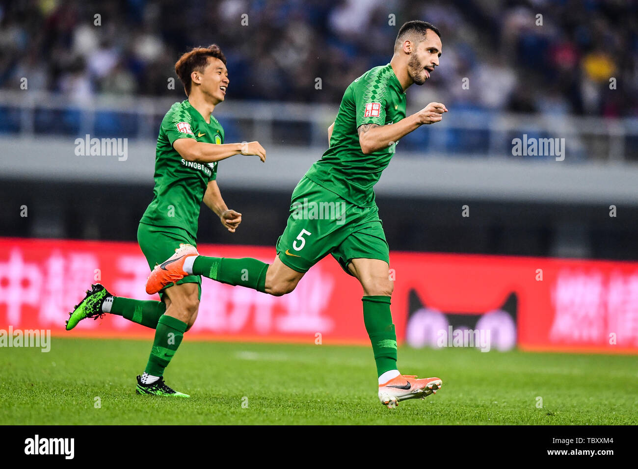 Brazilian football player Renato Soares de Oliveira Augusto, or simply Renato Augusto, of Beijing Sinobo Guoan celebrates after scoring against Tianjin TEDA in their 12th round match during the 2019 Chinese Football Association Super League (CSL) in Tianjin, China, 2 June 2019.  Beijing Sinobo Guoan defeated Tianjin TEDA 2-1. Stock Photo