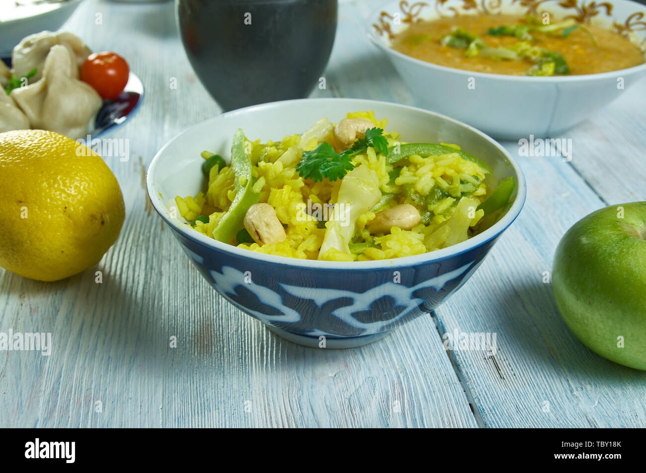 Tondli Bhaat, spicy preparation of rice and tendi,, Maharashtrian national  cuisine, Traditional assorted Asia dishes, Top view. Stock Photo