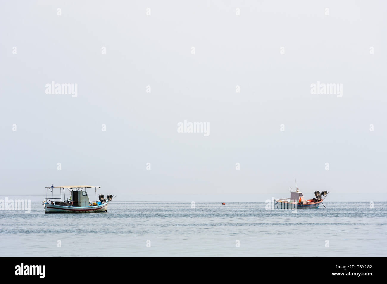 Two small boat sea hi-res stock photography and images - Alamy
