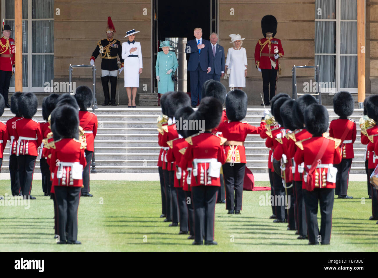 London, Britain. 3rd June, 2019. U.S. President Donald Trump (C, Rear) attends a welcome ceremony at Buckingham Palace in London, Britain, on June 3, 2019. U.S. President Donald Trump arrived in London on Monday to start his three-day state visit to Britain as widespread protests against him are set to take place. Credit: Ray Tang/Xinhua/Alamy Live News Stock Photo