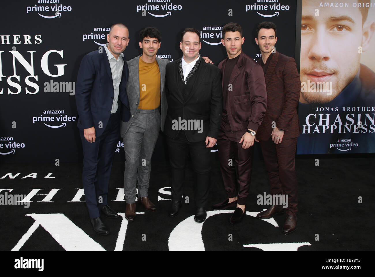 Los Angeles, Ca, USA. 3rd June, 2019. Phil McIntyre, Joe Jonas, John  Taylor, Nick Jonas, Kevin Jonas, at the World Premiere of Jonas Brothers'  Chasing Happiness at the Regency Bruin Theater in