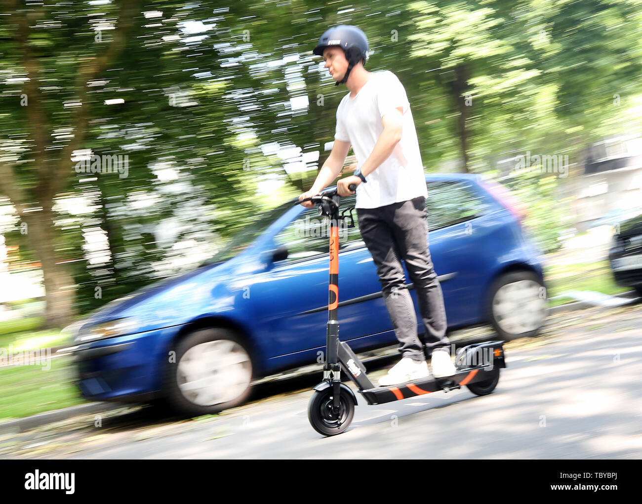 Herne, Germany. 04th June, 2019. Circ employee Max Brenssell is taking the Circ e-scooter (previously Flash) for a test drive. Even before electric pedal-scooters are allowed nationwide on 15 June, a first provider will start a rental service in the Ruhr area. In the city of Herne, several dozens of electric scooters are to be put on the road from 05.06.2019 with the permission of the local authorities. (to dpa 'First supplier of electric scooters starts in Herne') Credit: Roland Weihrauch/dpa/Alamy Live News Stock Photo