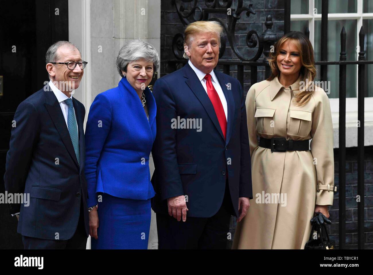 London, UK. 4th June, 2019. U.S. President Donald Trump (2nd R) and First Lady Melania Trump (1st R) pose for photos with British Prime Minister Theresa May (2nd L) and her husband Philip May (1st L) at 10 Downing Street in London, Britain on June 4, 2019. Credit: Alberto Pezzali/Xinhua/Alamy Live News Stock Photo