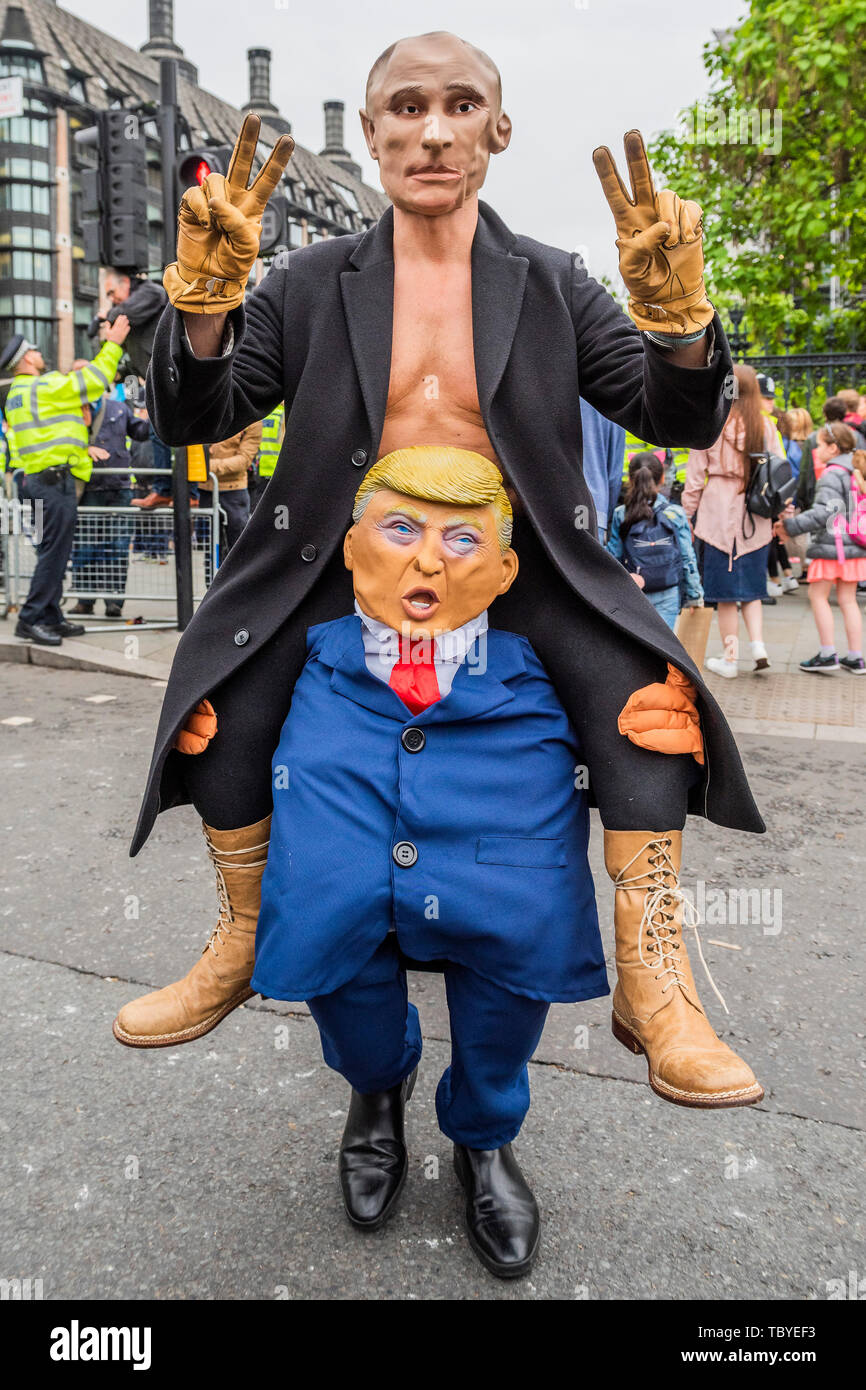 London Uk 4th June 2019 Putin Rides Trump People Protest The Visit Of Donald Trump The Us President In Parliament Square With The Aid Of A Giant Inflatable Trump Baby Credit