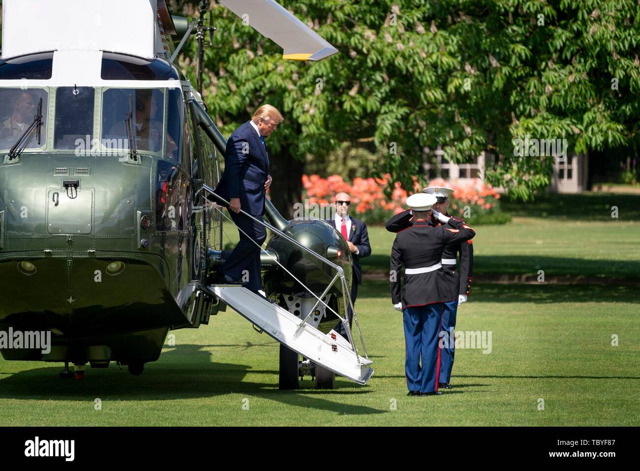 London, UK. 03rd June, 2019. U.S President Donald Trump steps off Marine One helicopter on arrival at Buckingham Palace for the official welcome ceremony June 3, 2019 in London, England. Credit: Planetpix/Alamy Live News Stock Photo