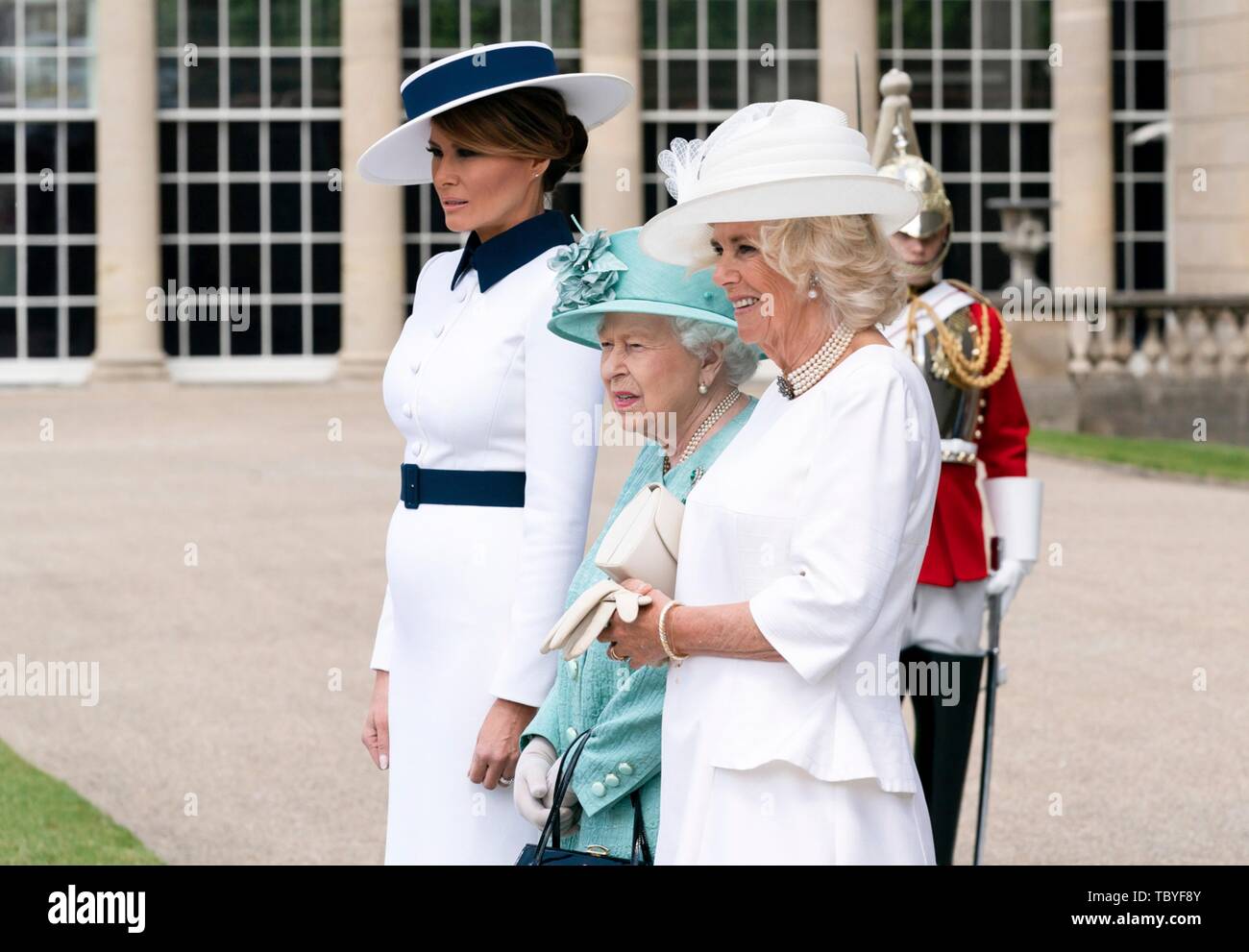 London, UK. 03rd June, 2019. U.S First Lady Melania Trump, stands alongside Queen Elizabeth II and the Duchess of Cornwall, right, during the official welcoming ceremony at Buckingham Palace June 3, 2019 in London, England. Credit: Planetpix/Alamy Live News Stock Photo