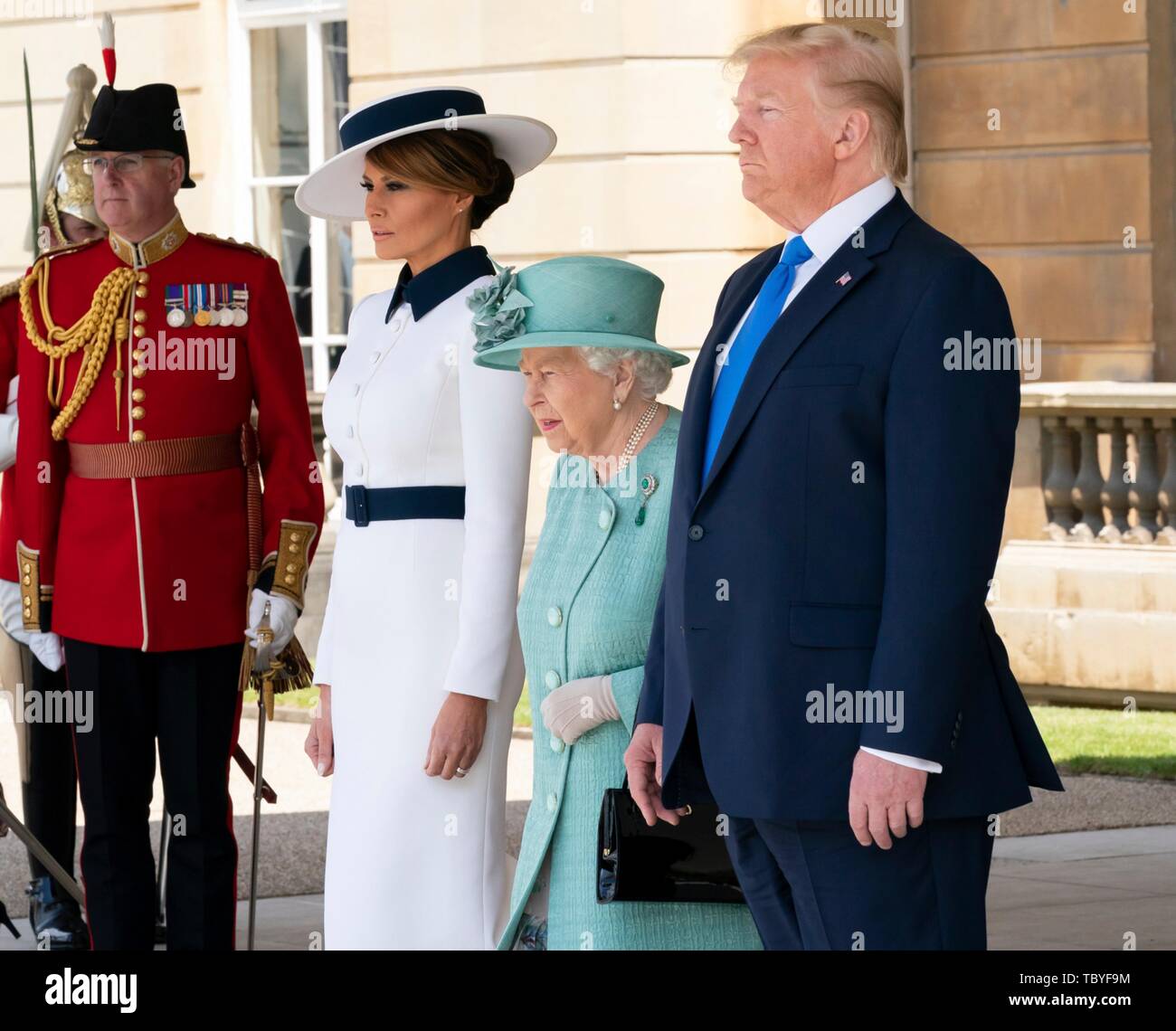 London, UK. 03rd June, 2019. U.S President Donald Trump, stands with First Lady Melania Trump, and Queen Elizabeth II for the national anthems during the official welcoming ceremony at Buckingham Palace June 3, 2019 in London, England. Credit: Planetpix/Alamy Live News Stock Photo