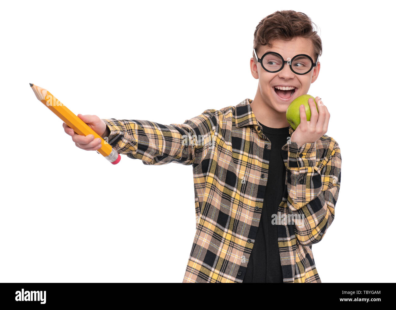 Teen boy with big pencil Stock Photo