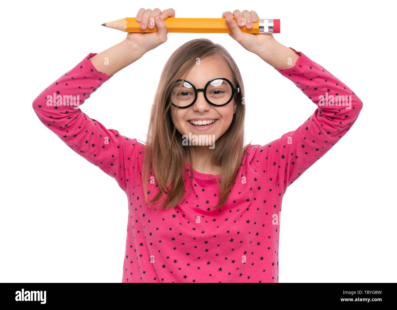 Teen girl with big pencil Stock Photo