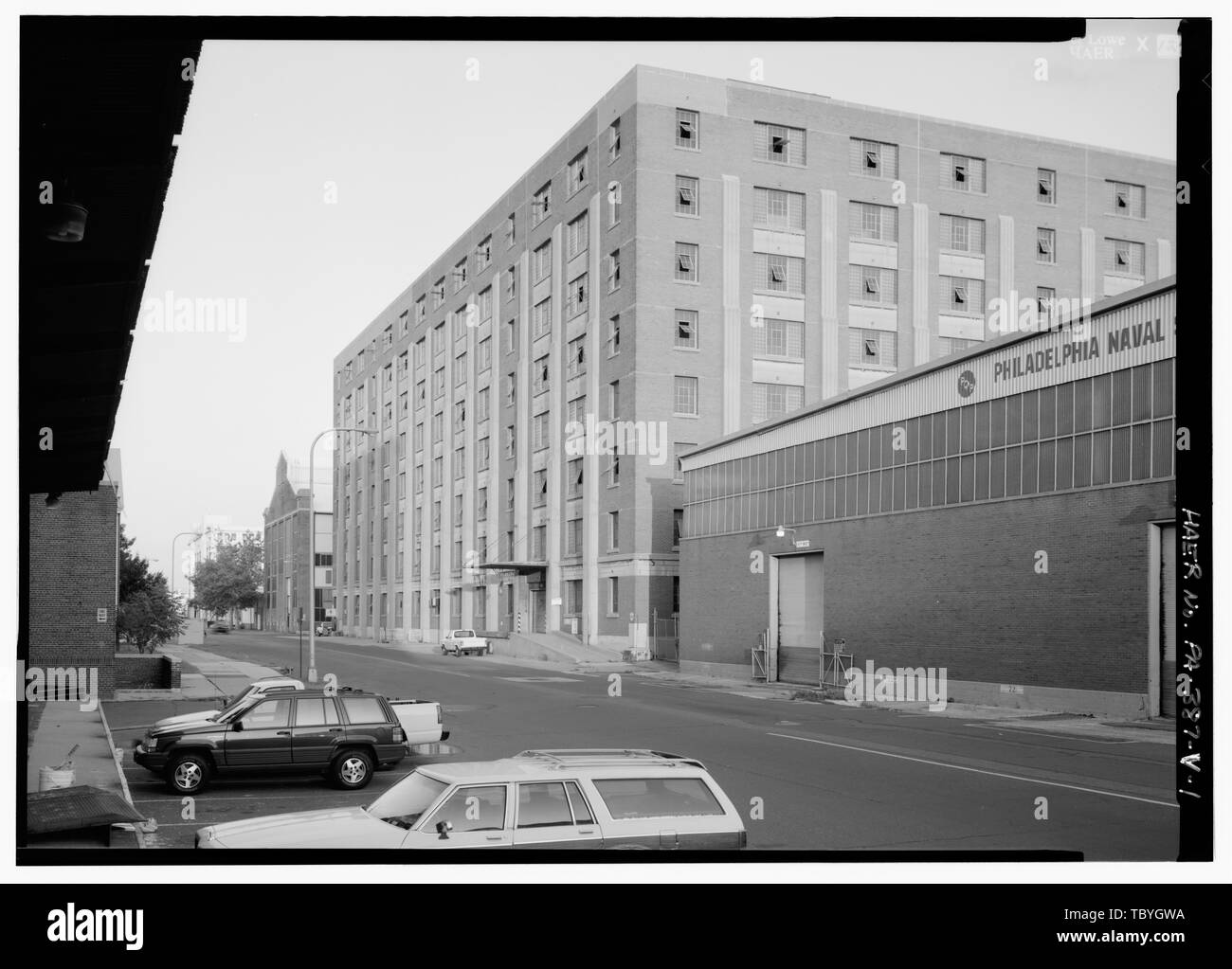 Main supply warehouse looking east building 544 in foreground. Naval