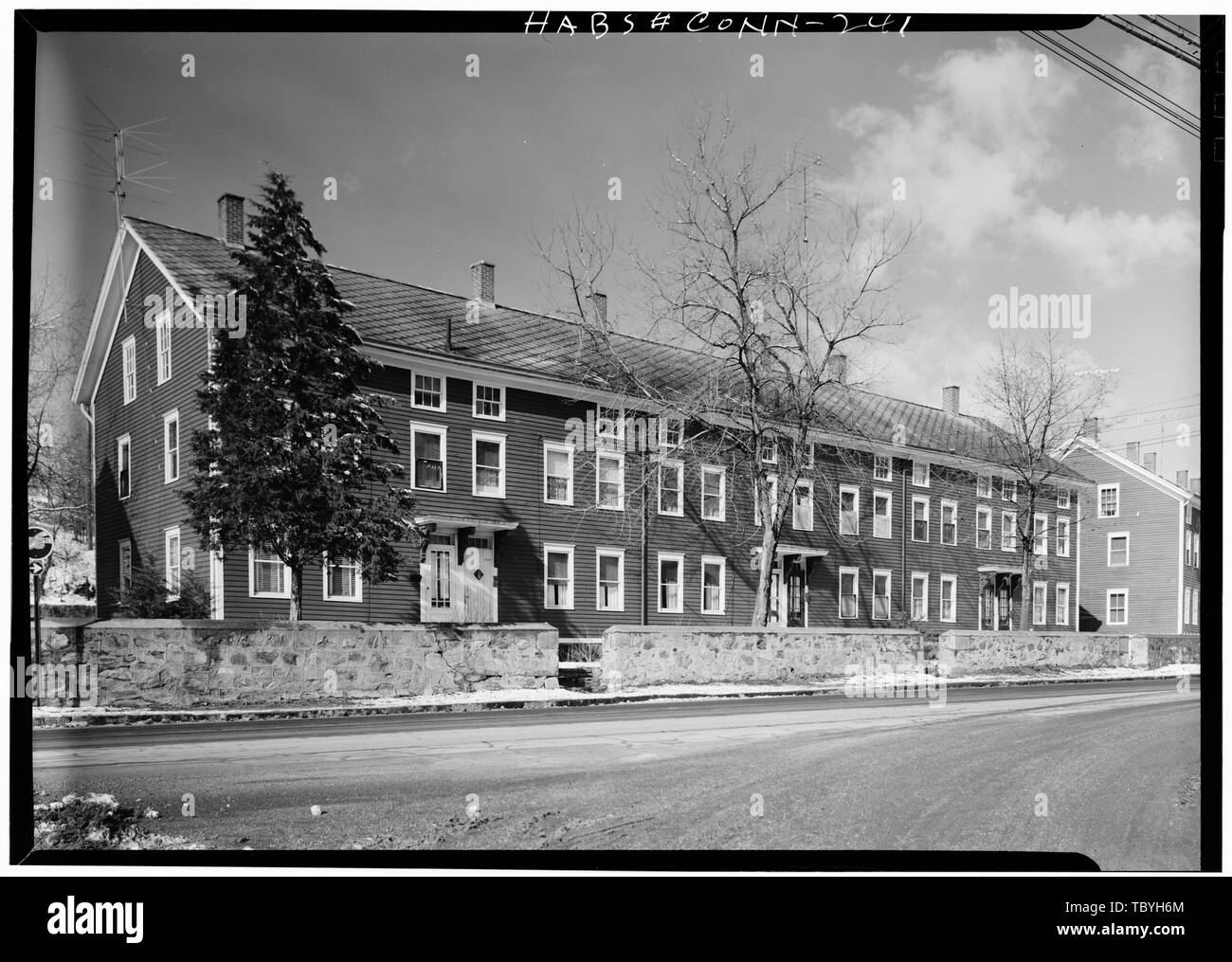 March 1961 EAST (FRONT) AND SOUTH ELEVATIONS OF A TYPICAL SECTION