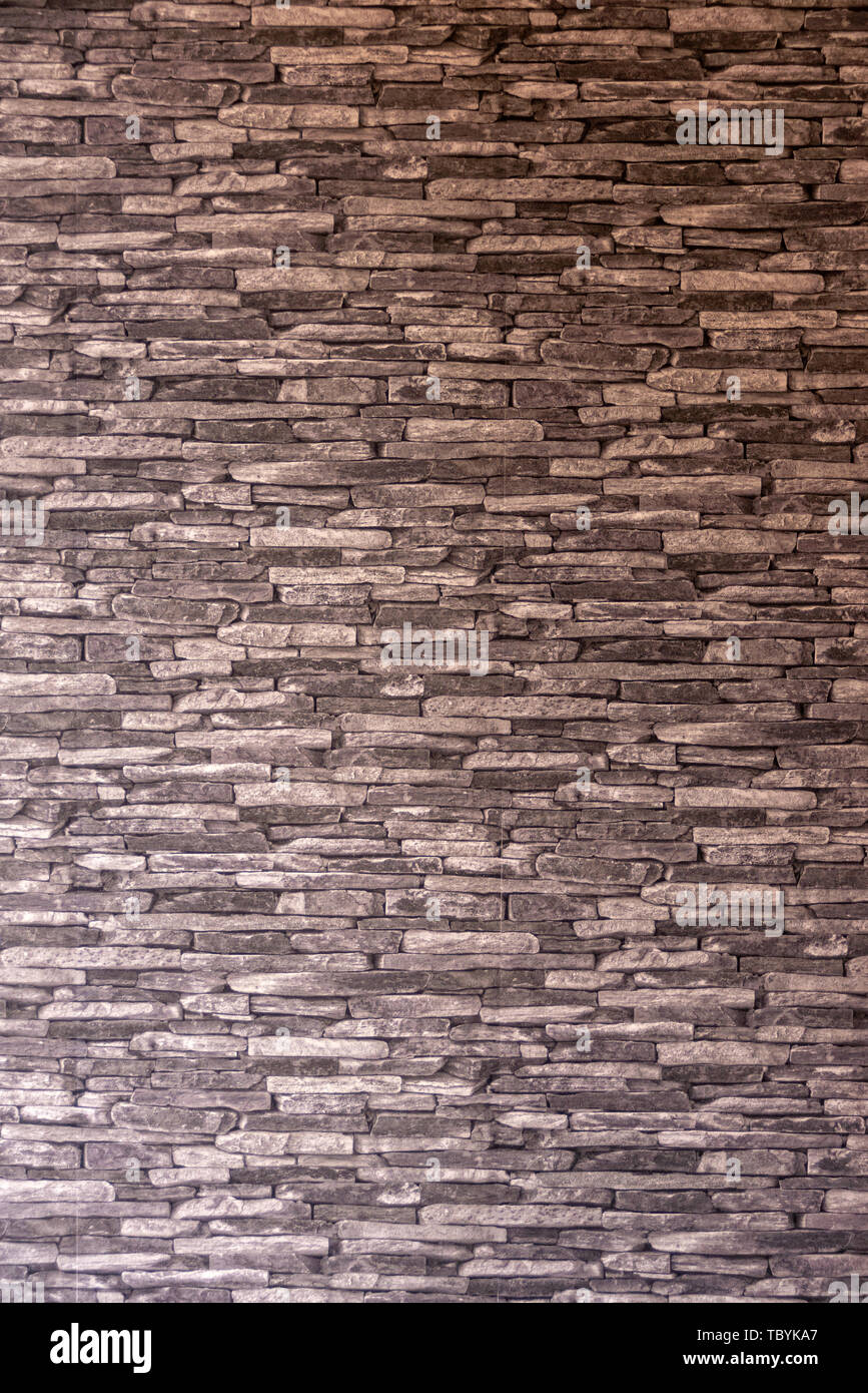realistic stone wall wallpaper Stock Photo