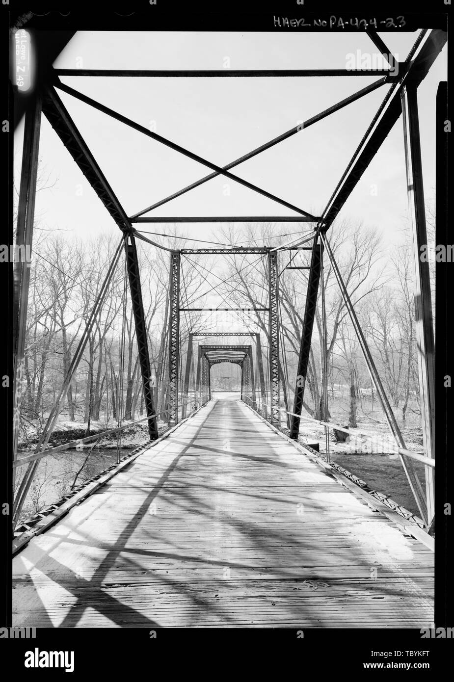 Midspan, view south towards portal.  Coverts Crossing Bridge, Spanning Mahoning River along Township Route 372 (Covert Road), New Castle, Lawrence County, PA Lawrence County Commissioners Morse Bridge Company Covert, John W Kirk, H M Craig, Jos Chambers, St S Wagoner, A G Morse, Henry G Morse, C J Lawrence County Bridge Department, sponsor GAI Consultants, Incorporated, contractor Christianson, Justine, transmitter Croteau, Todd, project manager Flores, Roland, field team project manager Dzodin, Joel S, historian Dzodin, Joel S, photographer Vidutis, Richard, historian Lowe, Jet, photographer  Stock Photo