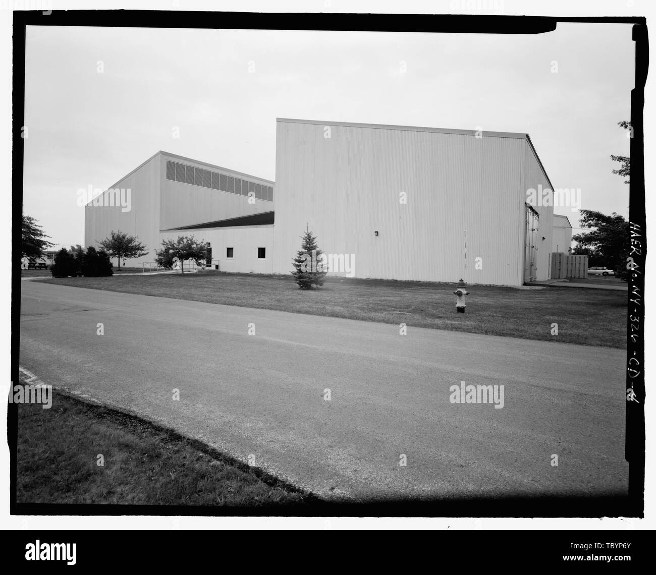NORTH (REAR) AND WEST (SIDE) ELEVATIONS OF BUILDING. VIEW TO SOUTHEAST ...