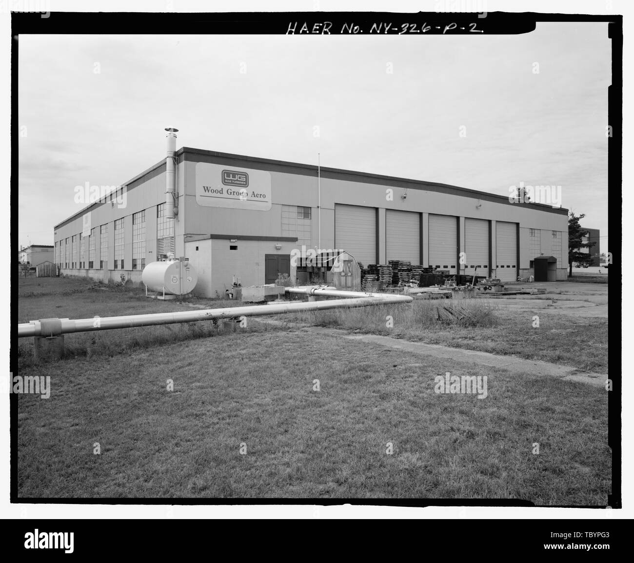 NORTH (SIDE) AND EAST (FRONT) ELEVATIONS OF BUILDING. view TO SOUTH