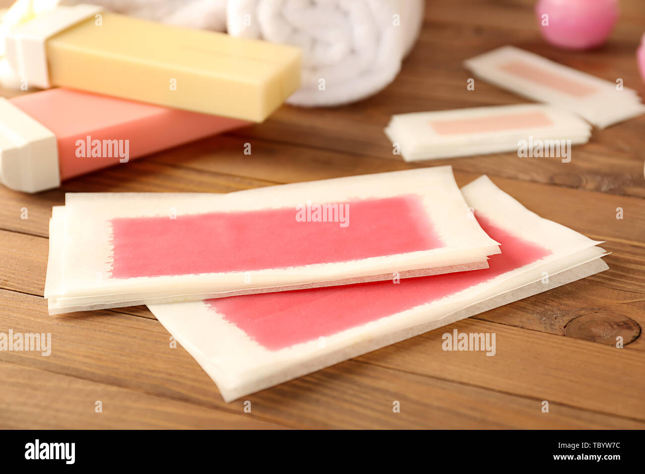 Wax Strips For Hair Removal On Wooden Background Stock Photo
