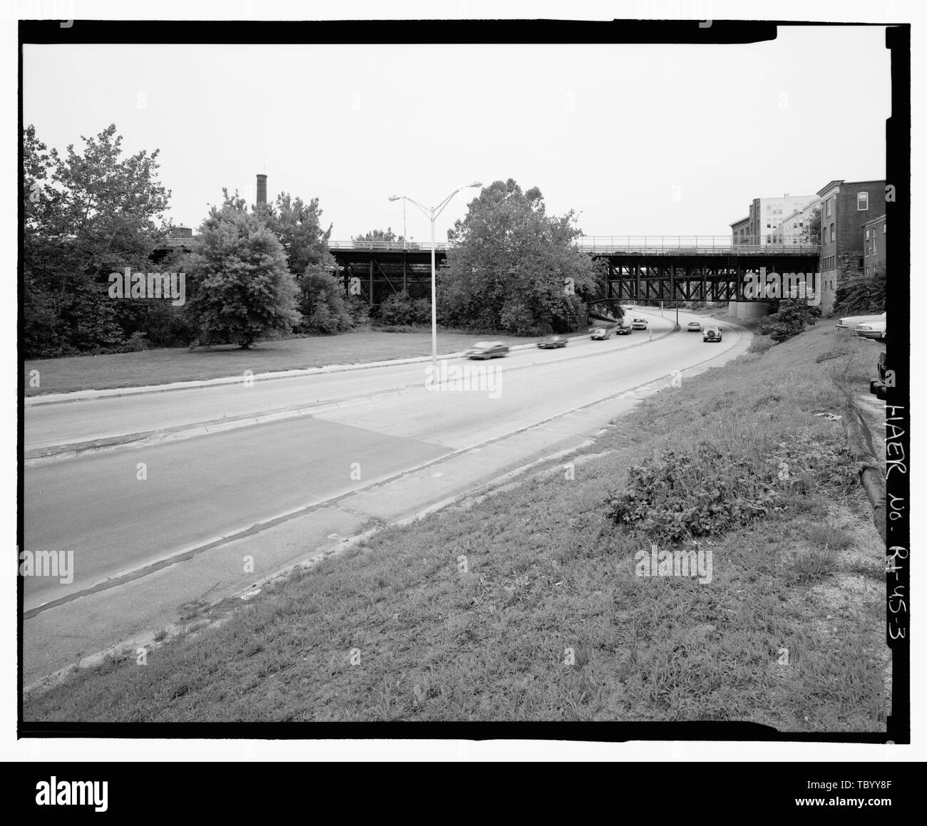 North elevation and Truman Drive, view south  Court Street Bridge, Court Street spanning Blackstone River and Truman Drive, Woonsocket, Providence County, RI Sweet, Arthur Aifson, Mary, transmitter Usher, Aaron, photographer Edward Connors and Associates, historian Stock Photo