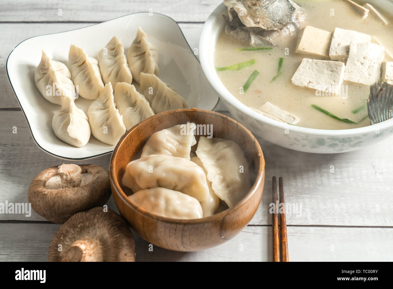 Dumplings and white wood grain background Stock Photo Alamy
