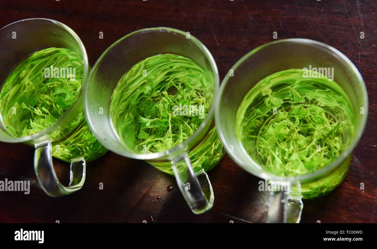 Tangle Tea Tangled blue tea Stock Photo - Alamy