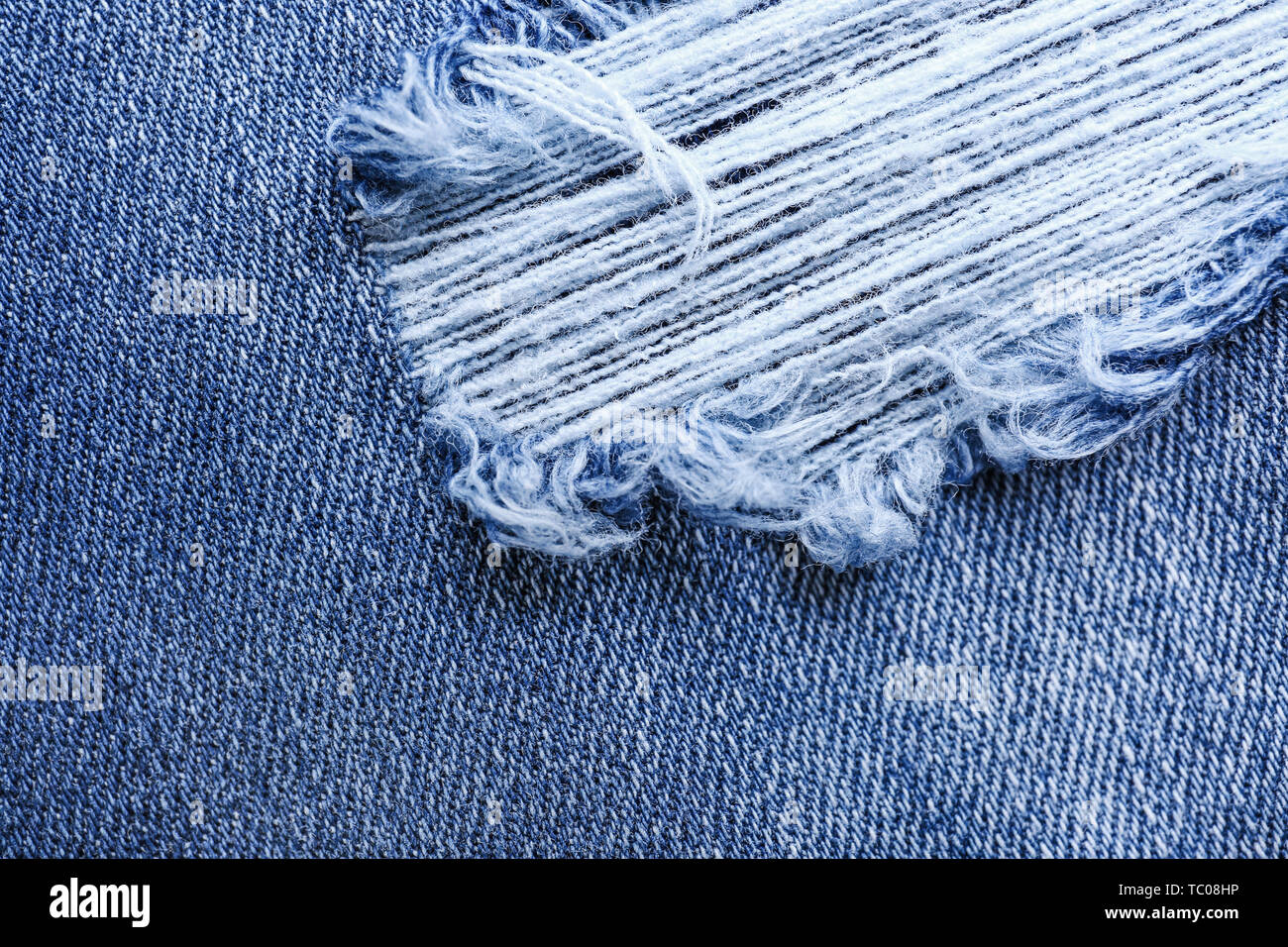 Stylish ripped jeans, closeup view Stock Photo - Alamy
