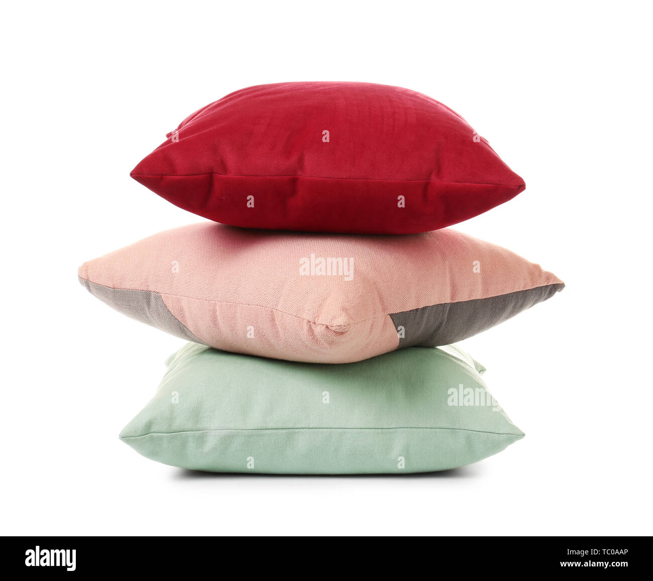 Stack of soft pillows on white background Stock Photo