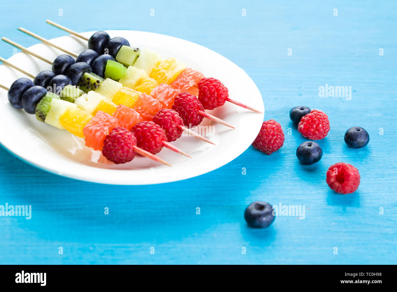Vibrant fresh fruit kebabs for a healthy snack Stock Photo Alamy
