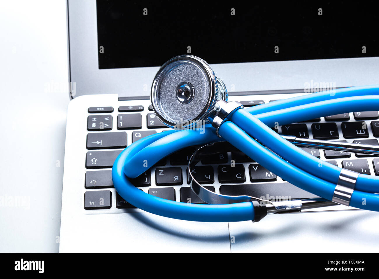 Medical stethoscope on computer keyboard Stock Photo - Alamy
