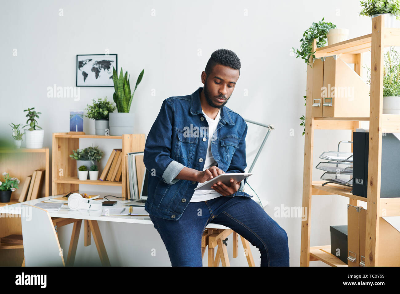 Guy with tablet Stock Photo