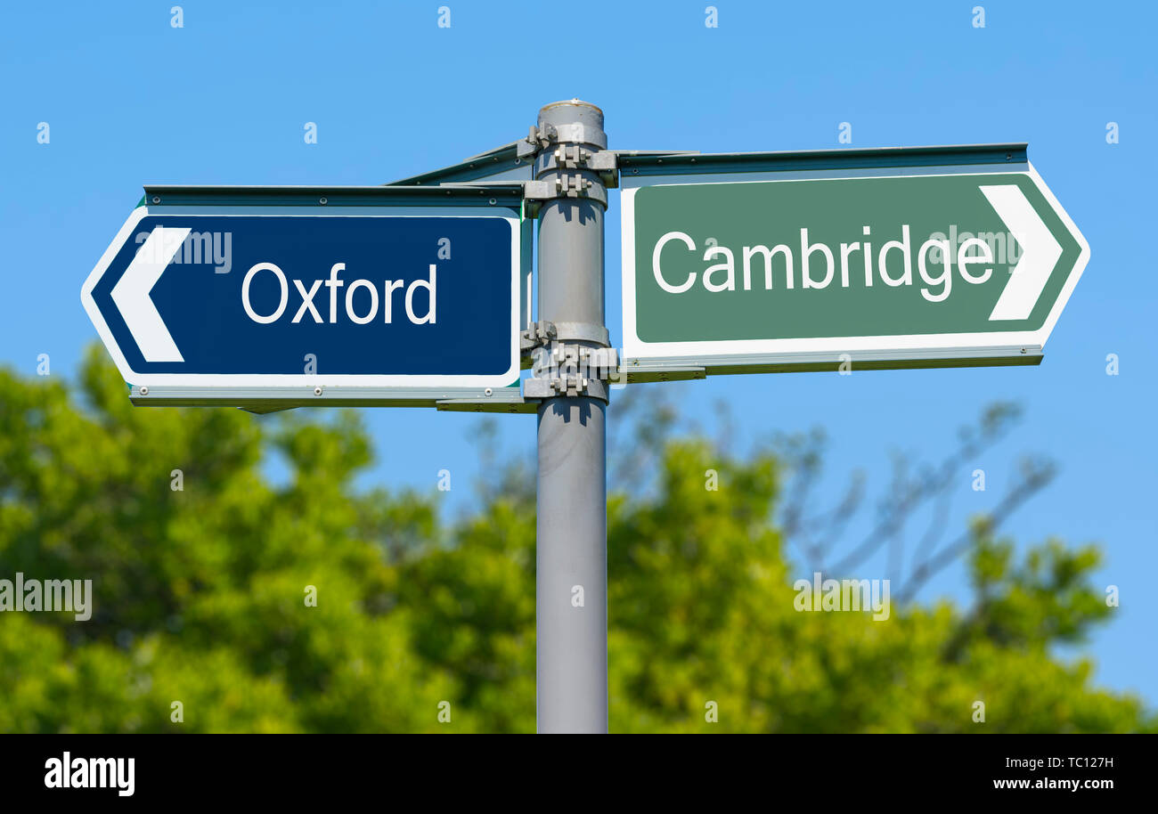 Sign to show a choice of going to Oxford university or Cambridge university. Option of British universities in England, UK. Stock Photo