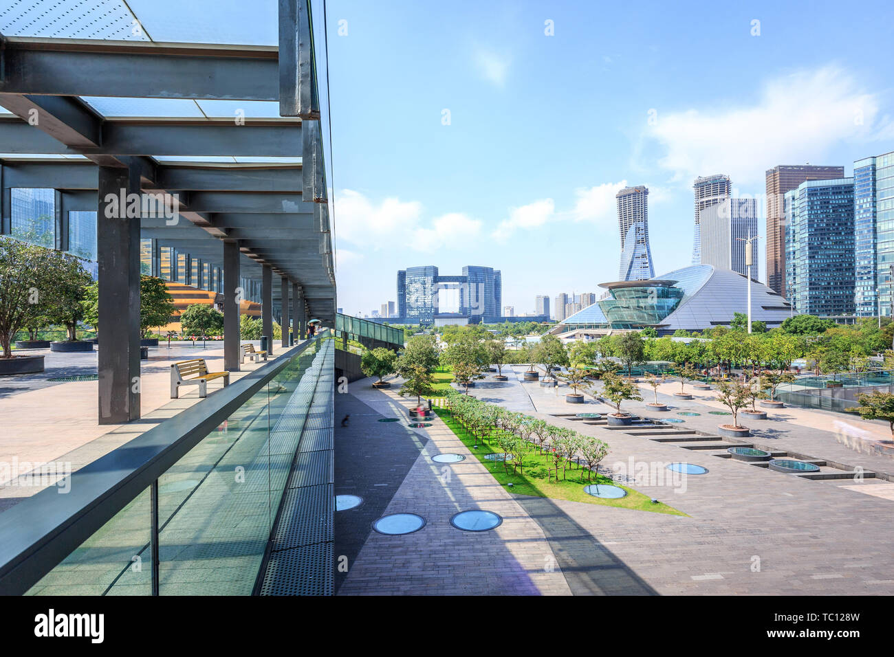 empty wooden road waterside and modern buildings Stock Photo - Alamy