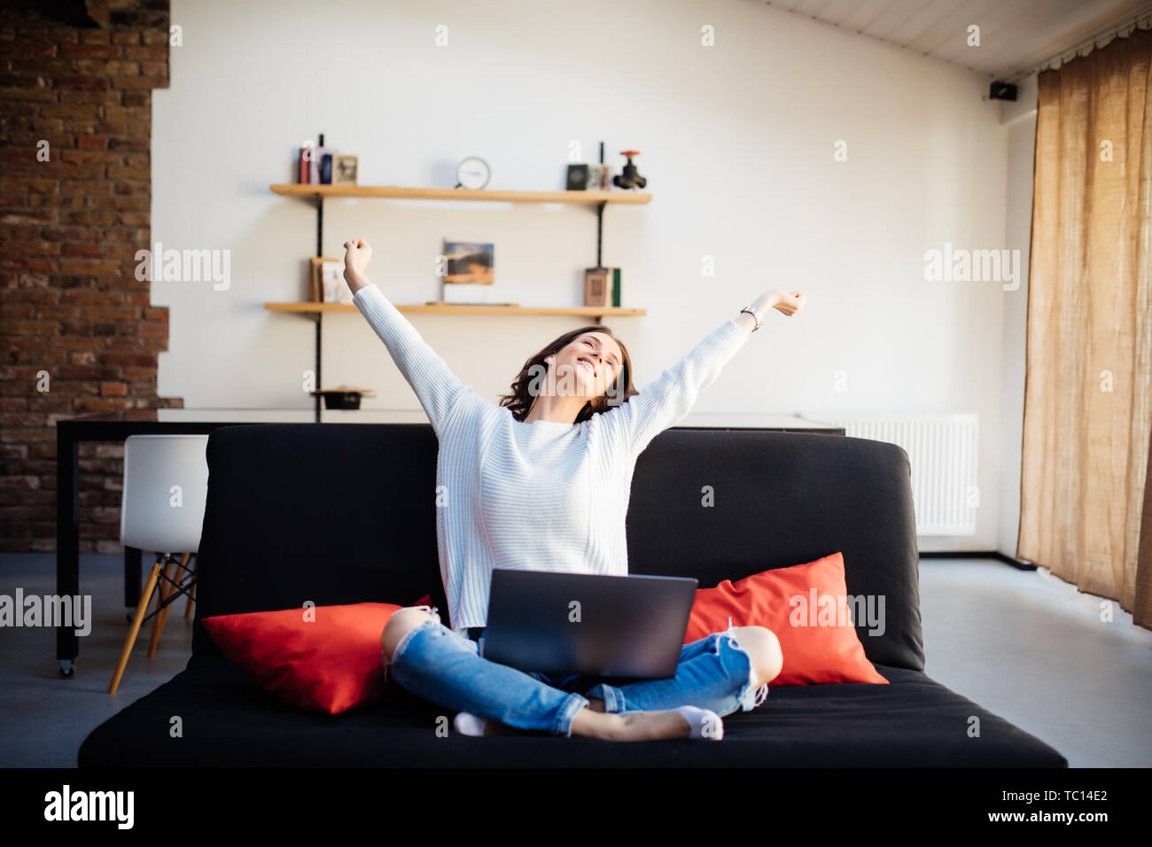 Angry young woman raising hand hi-res stock photography and images - Alamy