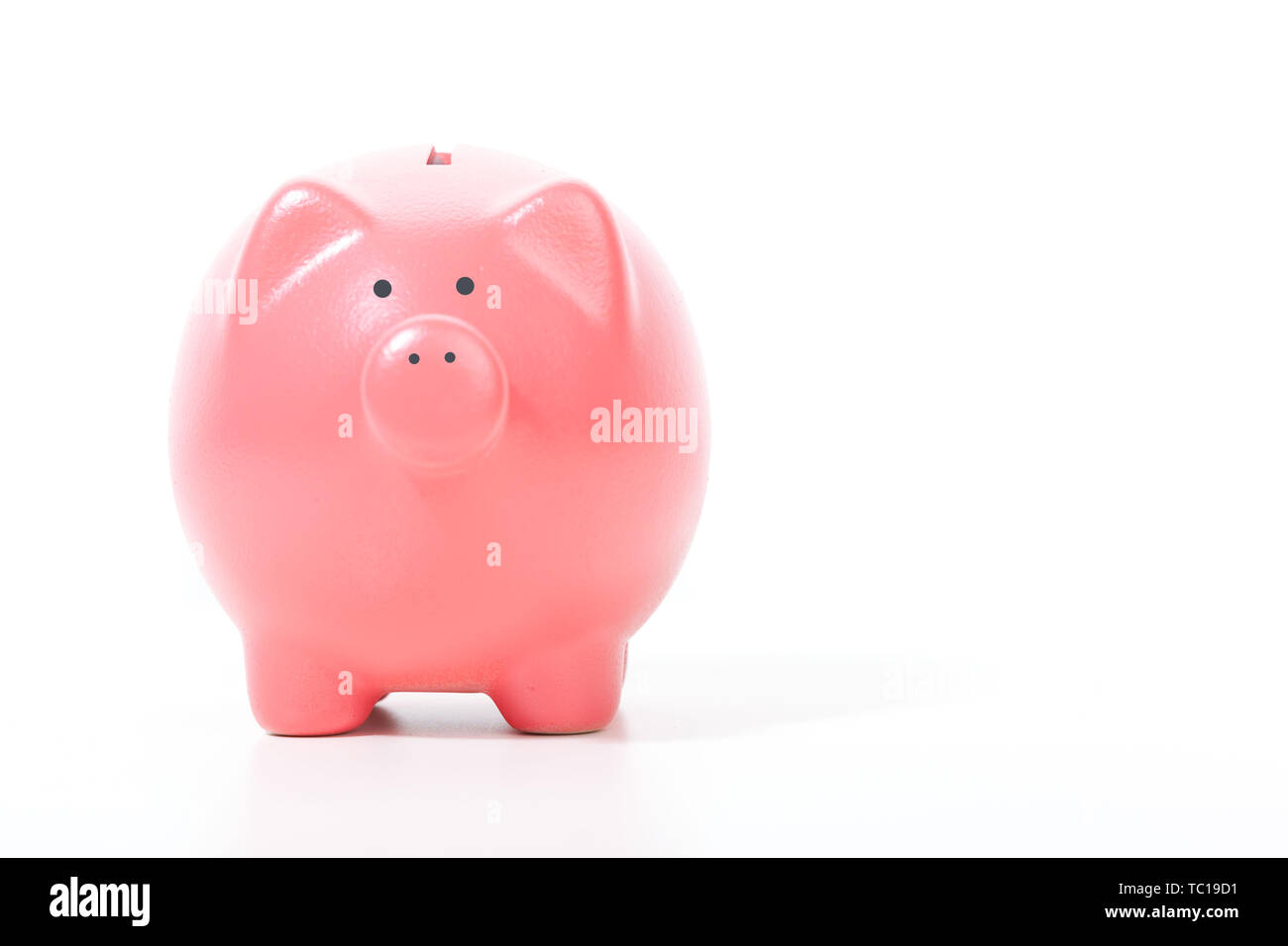 Piggy bank isolated on white background Stock Photo - Alamy
