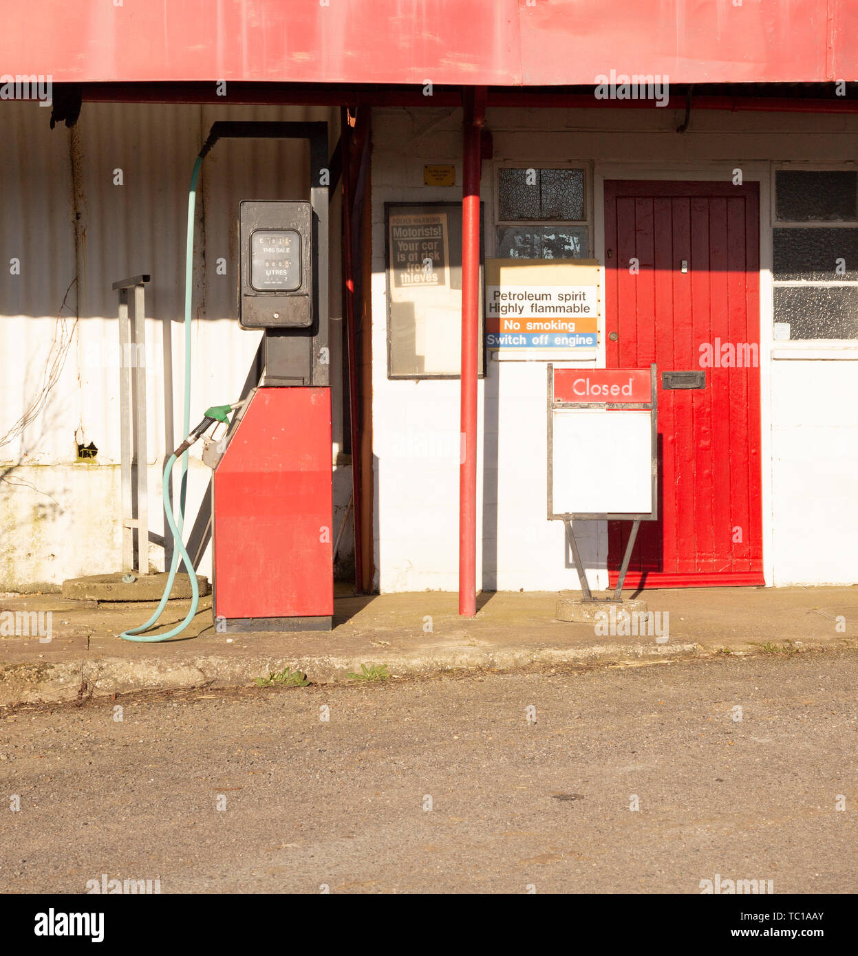 Closed redundant petrol station garage at Linstead, Suffolk, England, UK Stock Photo