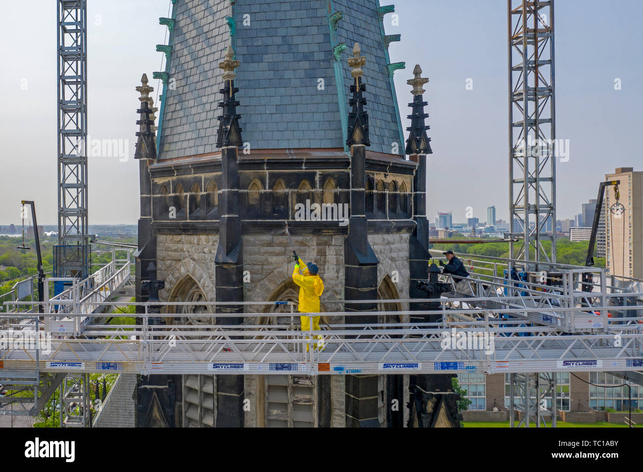 Detroit, Michigan - Steeple repair at St. Joseph Oratory Catholic Church. The steeple was damaged in a 2016 wind storm. Workers from Detroit Cornice a Stock Photo