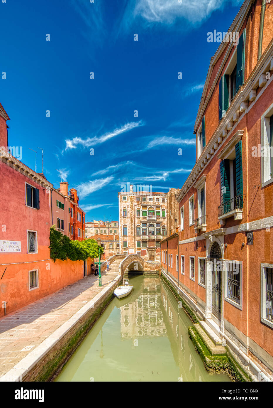 VENEZIA, ITALY – MAY 31, 2019: tourists visiting the city and enjoying the view of waters flowing in Rio di San Boldo, water channel of Venice along F Stock Photo