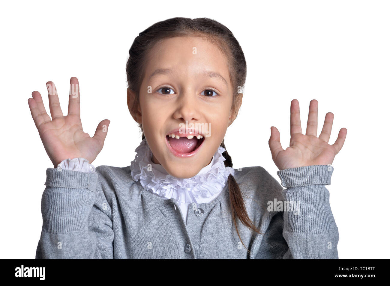 Cute little girl posing isolated on white background Stock Photo - Alamy