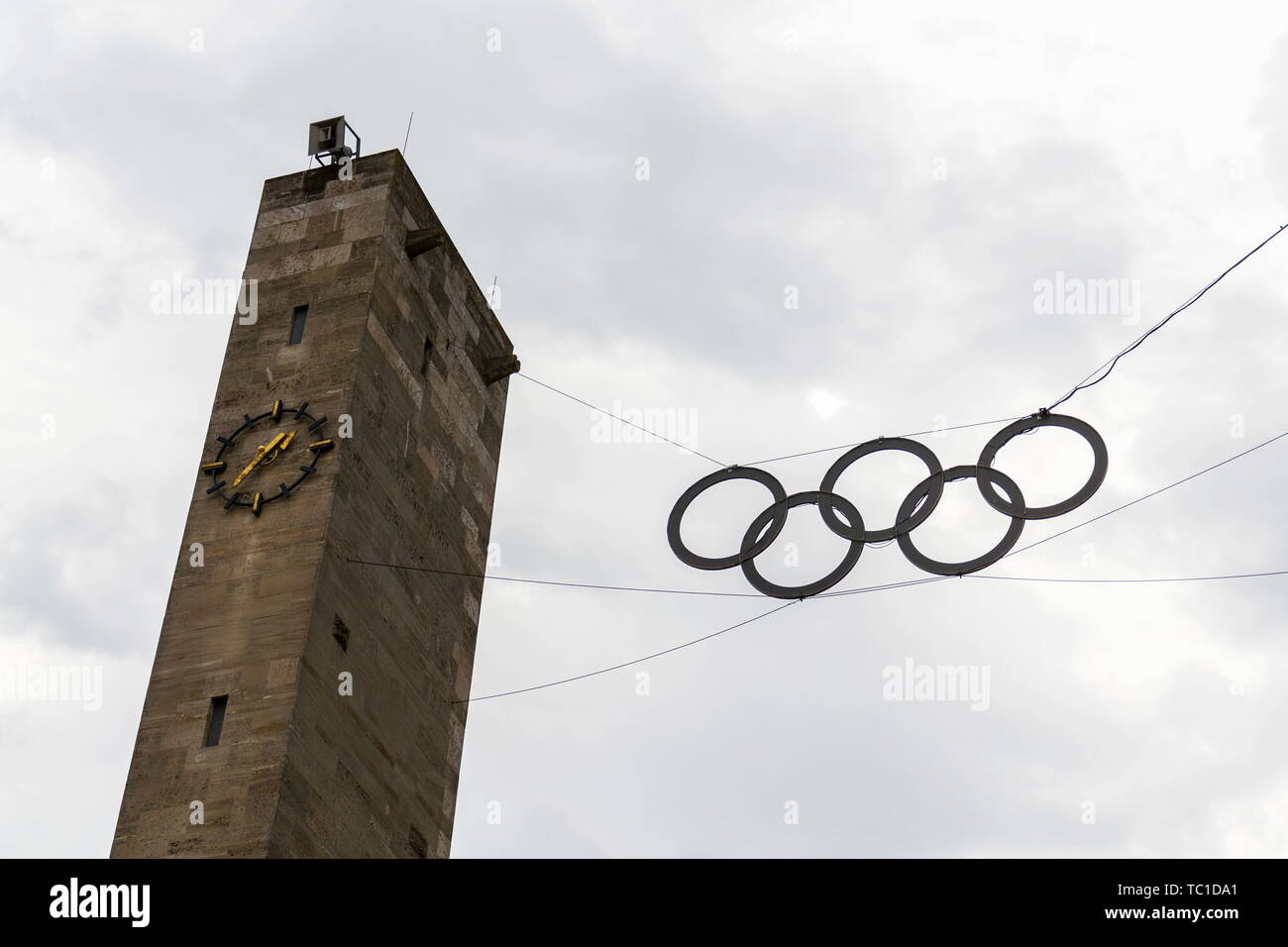 Olympic rings symbol hanging over Olympic stadium from 1936 in Berlin