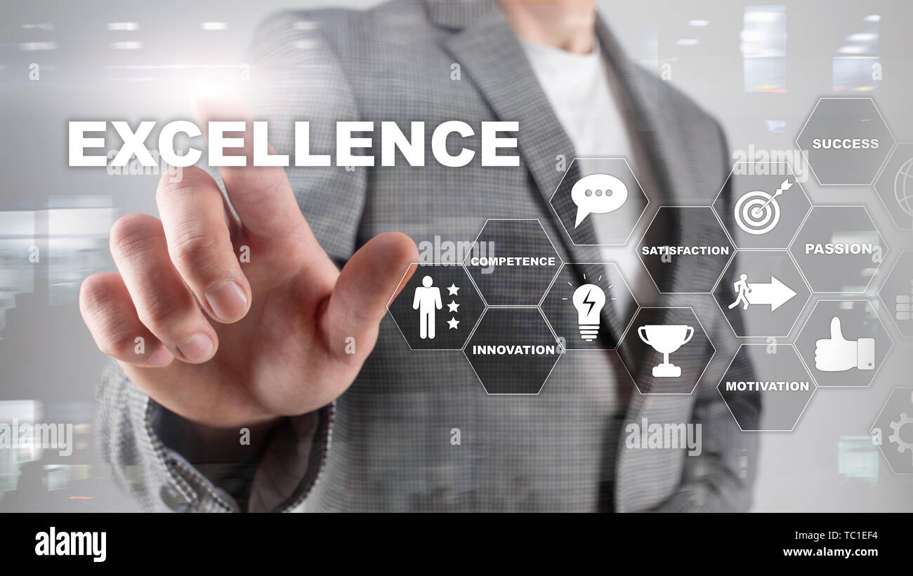 Achieve Business Excellence as concept. Pursuit of excellence. Blurred business center background. Stock Photo