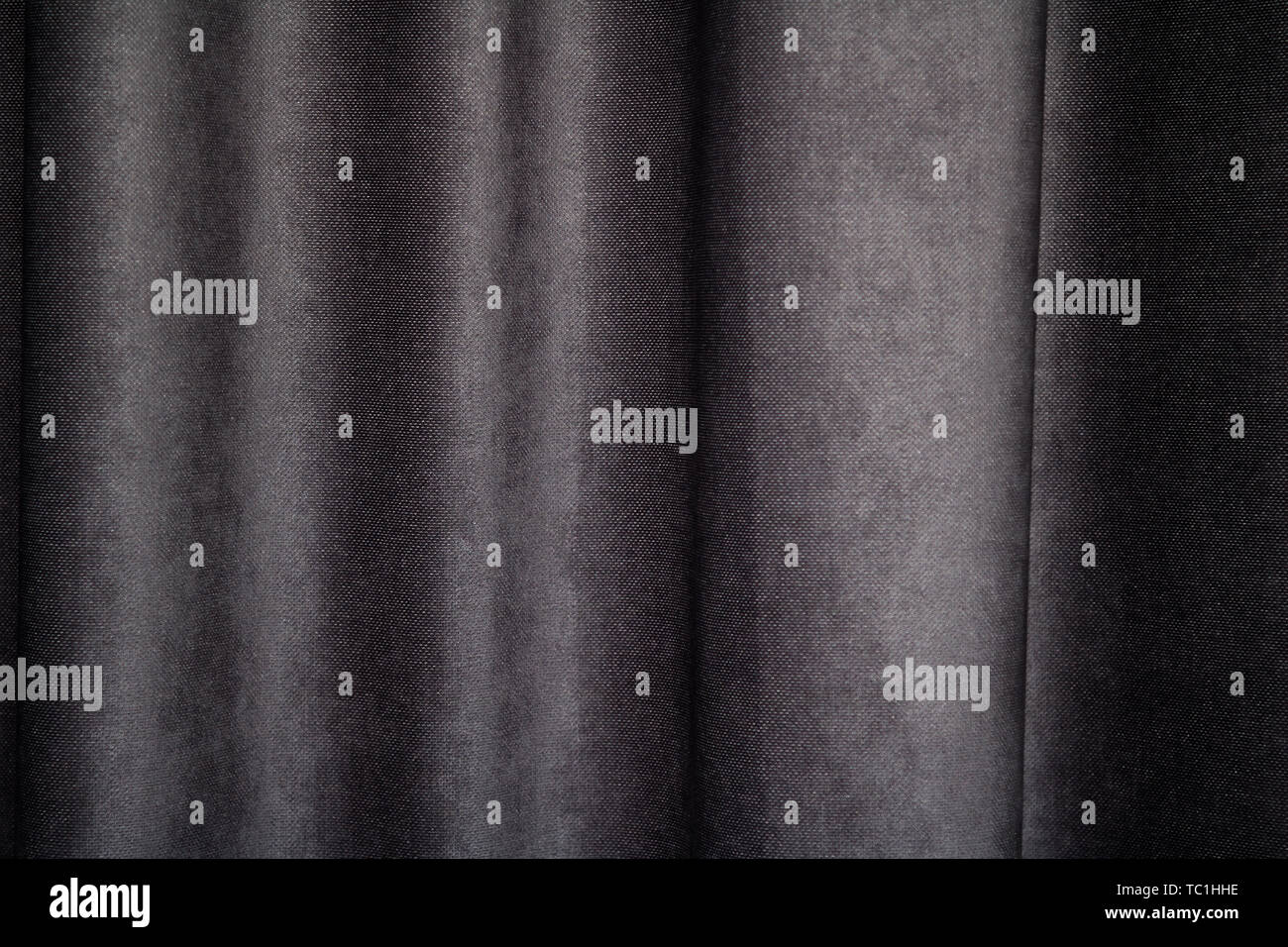 Dark fabric textile curtain texture Stock Photo